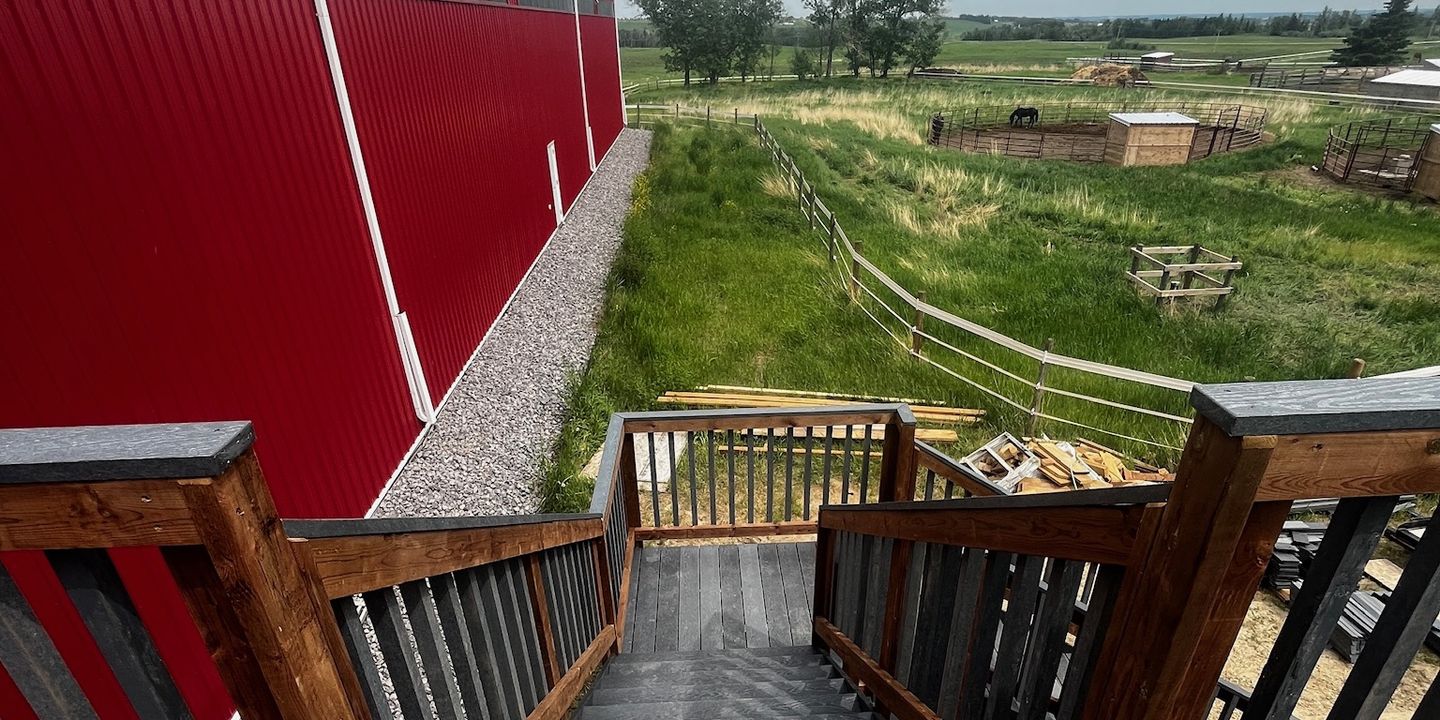 Recycled plastic lumber at a central Alberta farm shop with prairie beyond